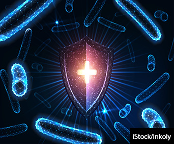 Antibacterial medical protection concept with glowing low polygonal shield and bacteria on dark blue background.